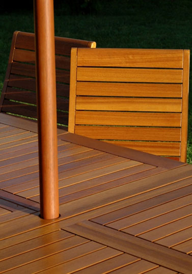 teak chair and umbrella